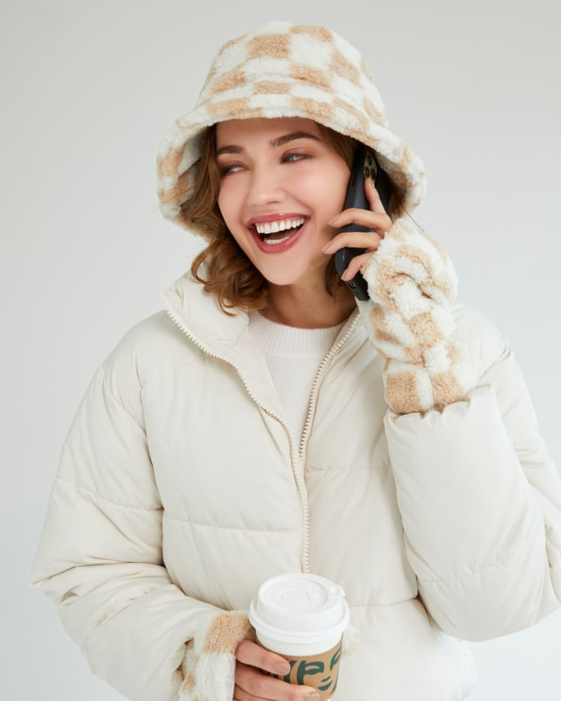 Front of a model wearing a size One Size Anya Bucket Hat in Tan by Shiraleah. | dia_product_style_image_id:308014